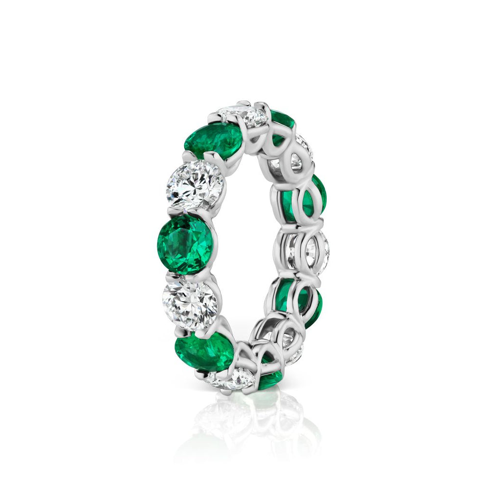 EMERALD AND DIAMOND BAND, 6.73 CARATS