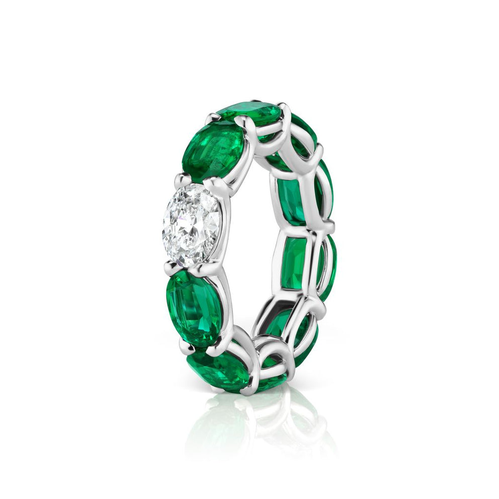 EMERALD AND DIAMOND ETERNITY BAND RING, 7.71 CARATS