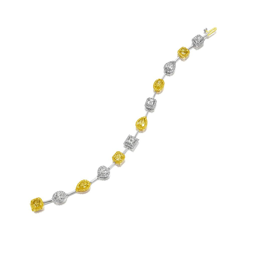 GIA CERTIFIED YELLOW AND WHITE DIAMOND BRACELET, 10.71 CARATS